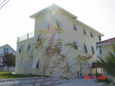 Eurex Bahama Shutters install on house