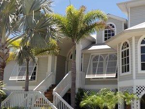 bahama style hurricane shutters on a south florida home