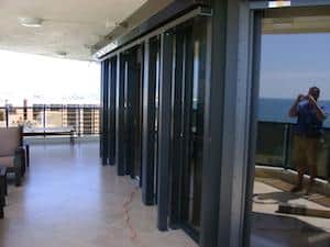 accordion shutters on the blacony of a condo