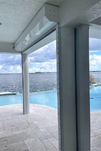 motorized roll down hurricane shutters on home in cape coral