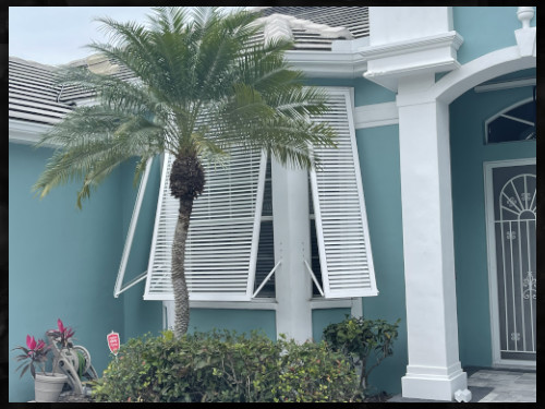 white bahama shutters on home in englewood florida