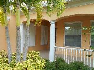 white accordion hurricane shutters