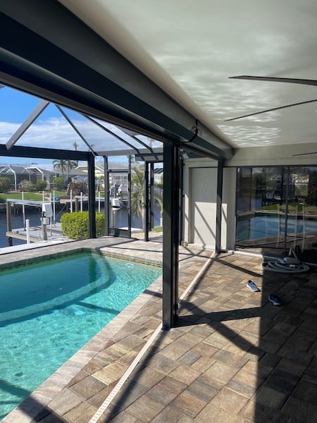 Roll down shutters installed on the patio of a home in Cape Coral FL