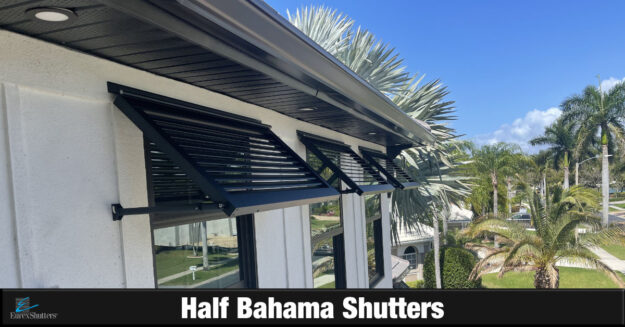 Black half bahama shutters on a white home in Southwest Florida