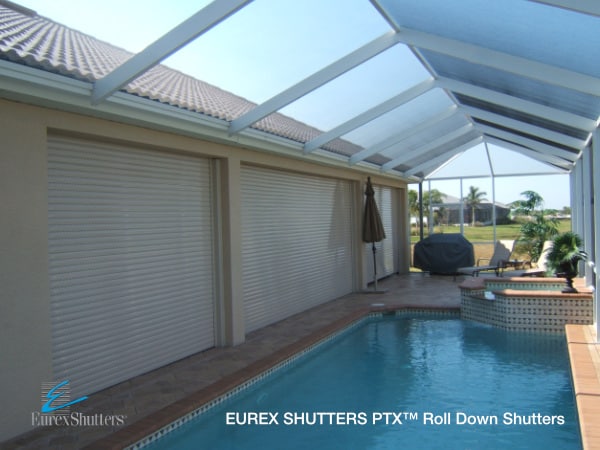 White roll down shutters near pool all are closed.