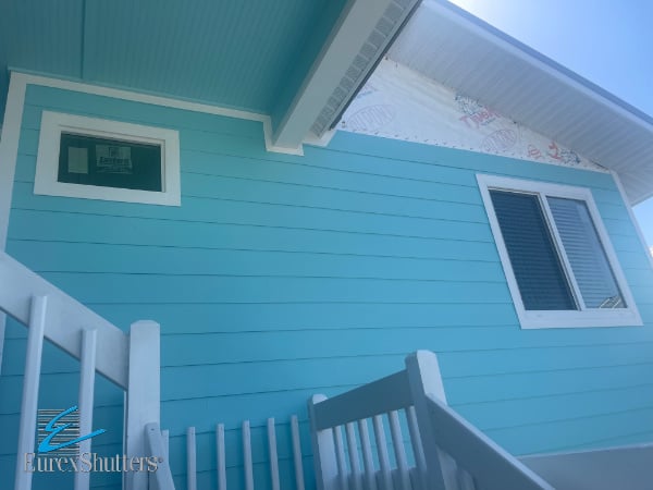 White impact resistant windows on a home in Bokeelia Pine Island FL