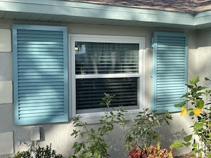 Tiffany blue aluminum Bahama shutters