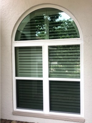 Window replacement with white, vinyl, impact replacement windows