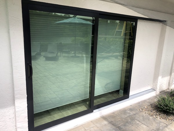 Impact glass sliding door