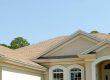 Asphalt shingle roof on a tan home in Florida