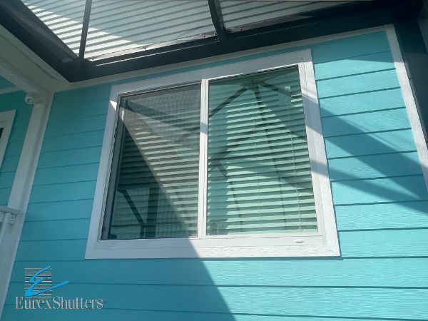 White vinyl impact window, recently installed by Eurex Shutters
