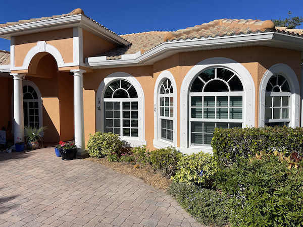 Home with shatterproof or unbreakable, laminated glass windows