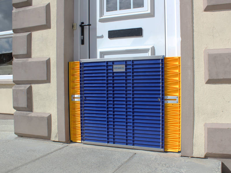 DamEasy temporary flood barrier for home door.